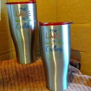 A set of thermal stainless steel cups with lids.   The lake is calling.!!